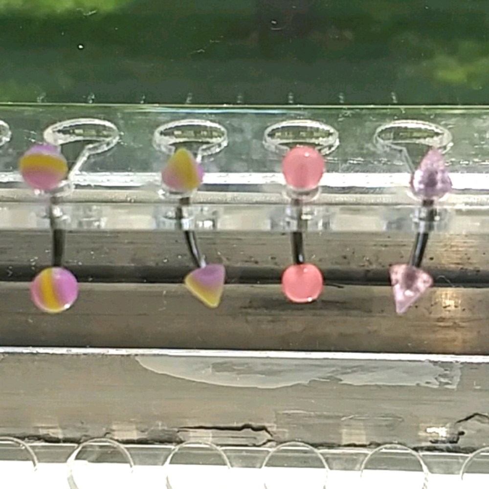 Pink UV/Marble mix eyebrow/vertical labret rings🌟